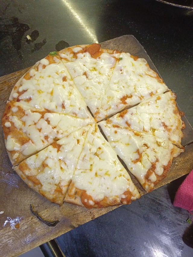 Delicious Margherita Pizza prepared by COOX