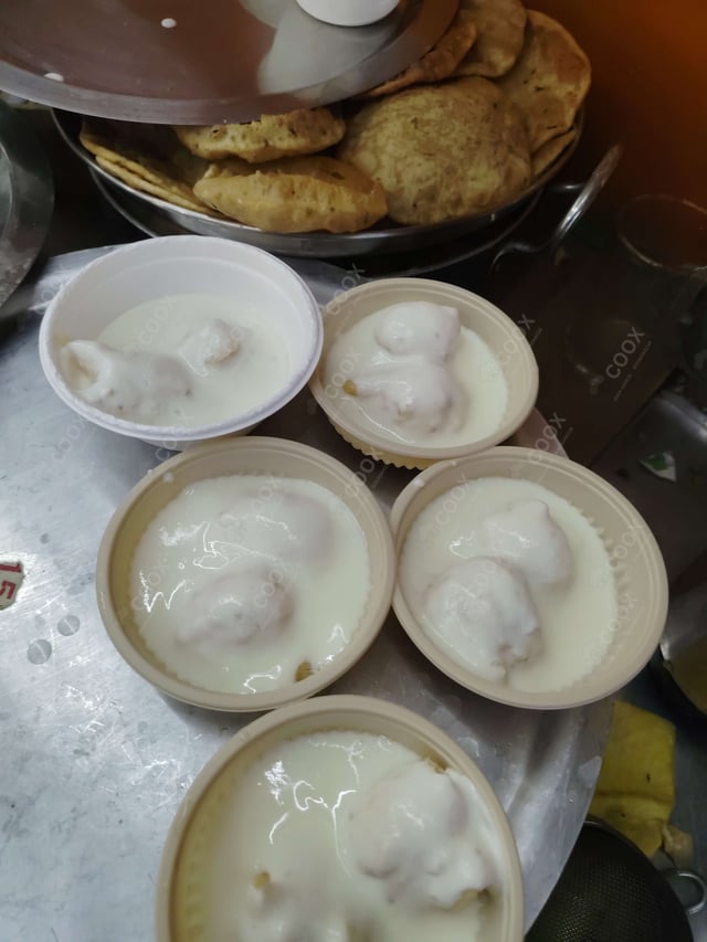 Delicious Dahi Bhalla prepared by COOX