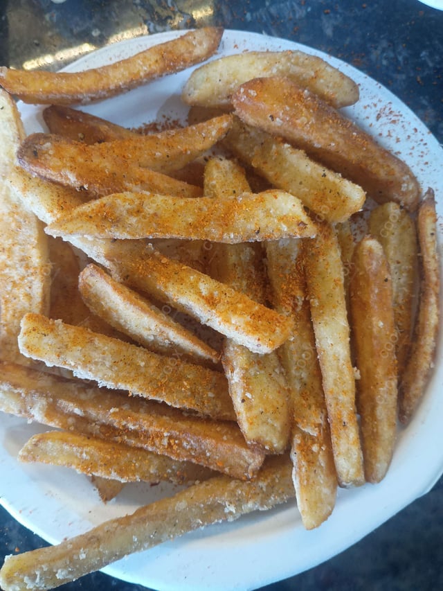 Delicious Peri Peri Fries prepared by COOX
