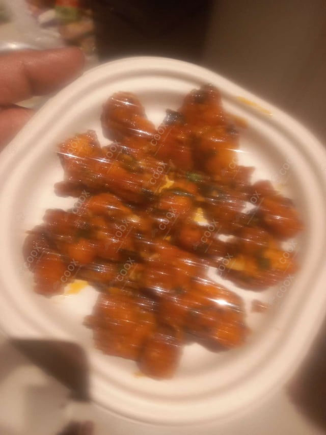 Tasty Thai Basil Chicken cooked by COOX chefs cooks during occasions parties events at home