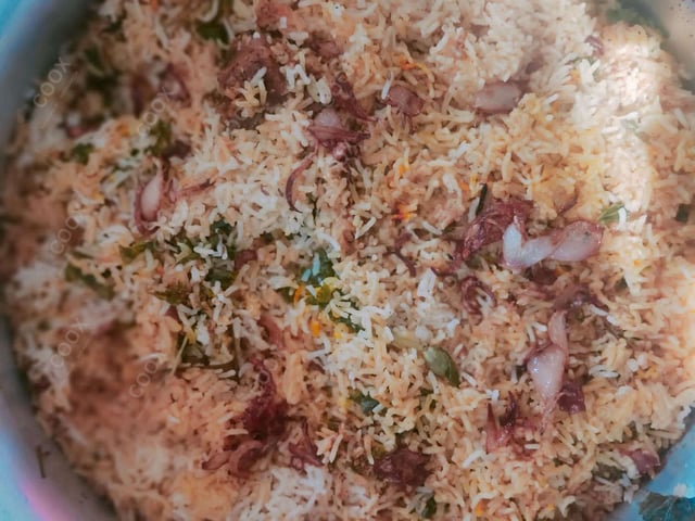 Tasty Mutton Biryani cooked by COOX chefs cooks during occasions parties events at home