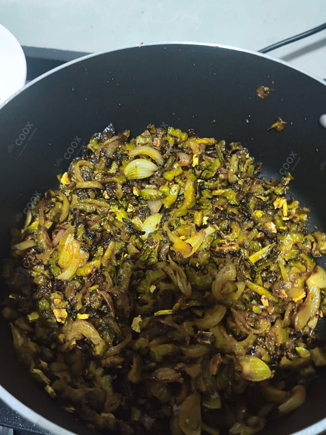 Delicious Karele ki Sabzi prepared by COOX