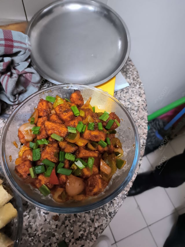 Delicious Chilli Paneer (Dry) prepared by COOX
