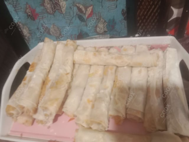 Delicious Veg Spring Rolls prepared by COOX