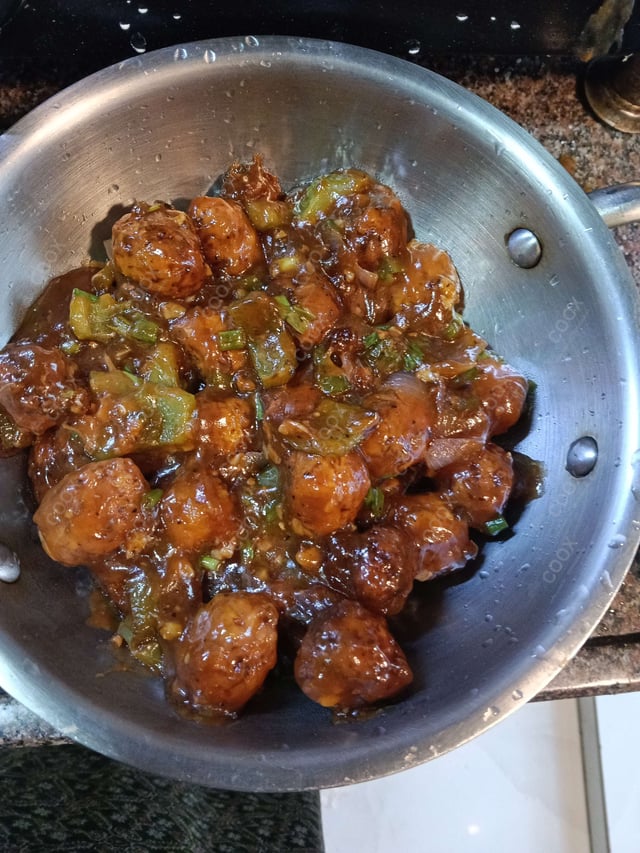 Delicious Veg Manchurian (Gravy) prepared by COOX