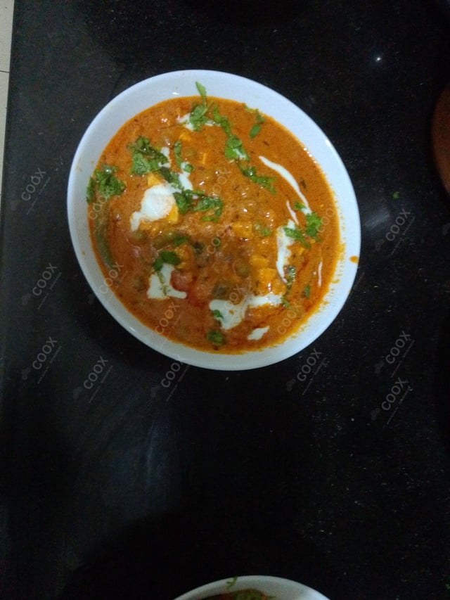 Delicious Matar Paneer prepared by COOX