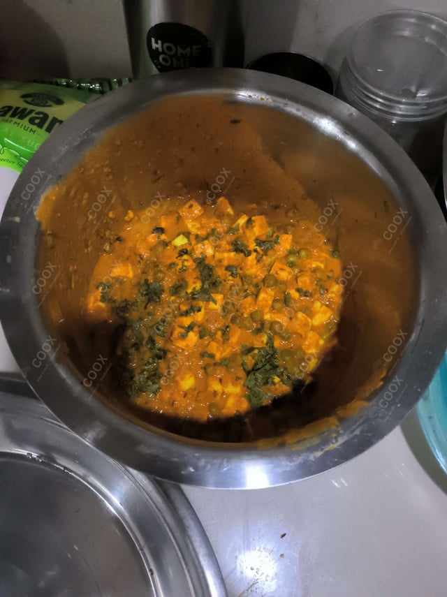 Delicious Matar Paneer prepared by COOX