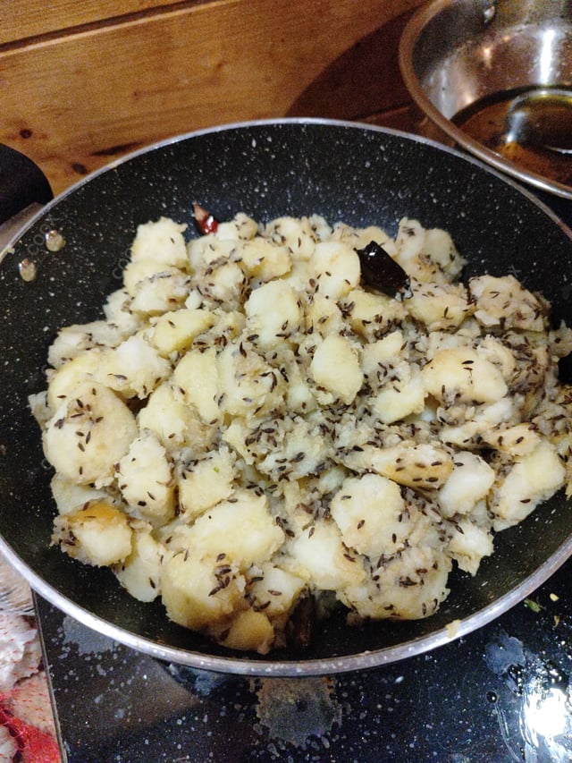 Delicious Jeera Aloo prepared by COOX