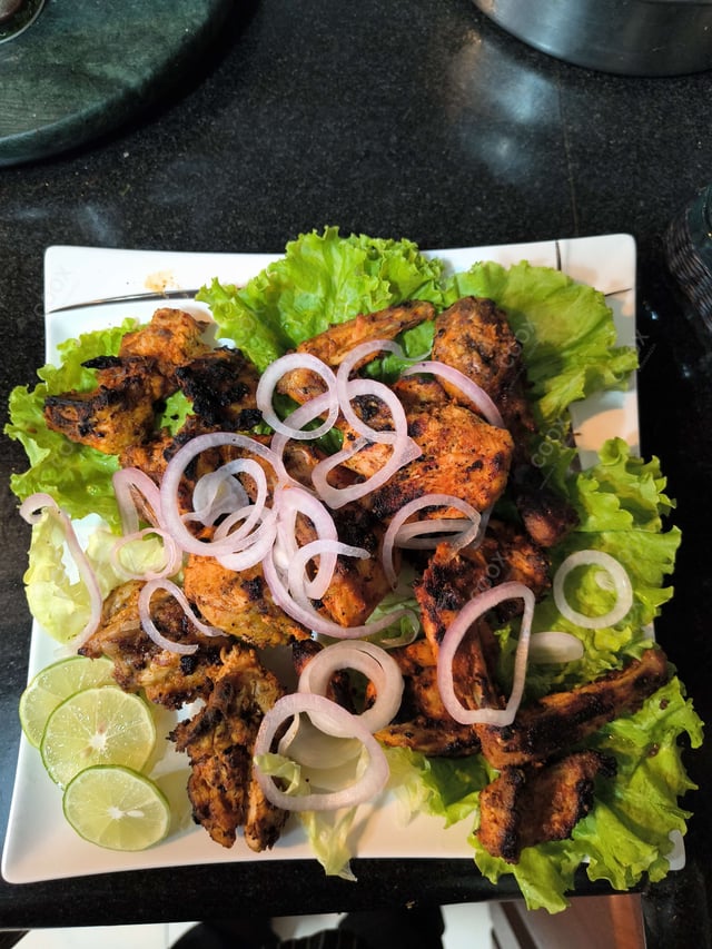 Delicious Tandoori Chicken prepared by COOX
