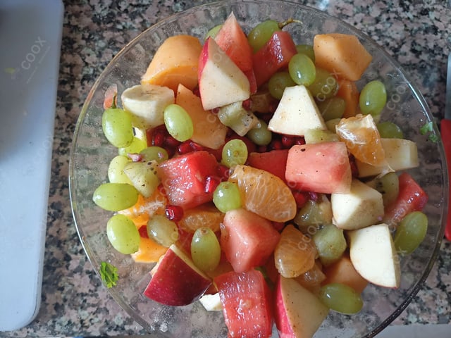 Tasty Fruit Chaat cooked by COOX chefs cooks during occasions parties events at home