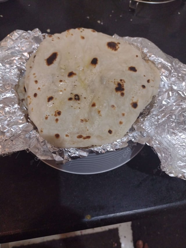 Tasty Naan (Butter / Garlic) cooked by COOX chefs cooks during occasions parties events at home