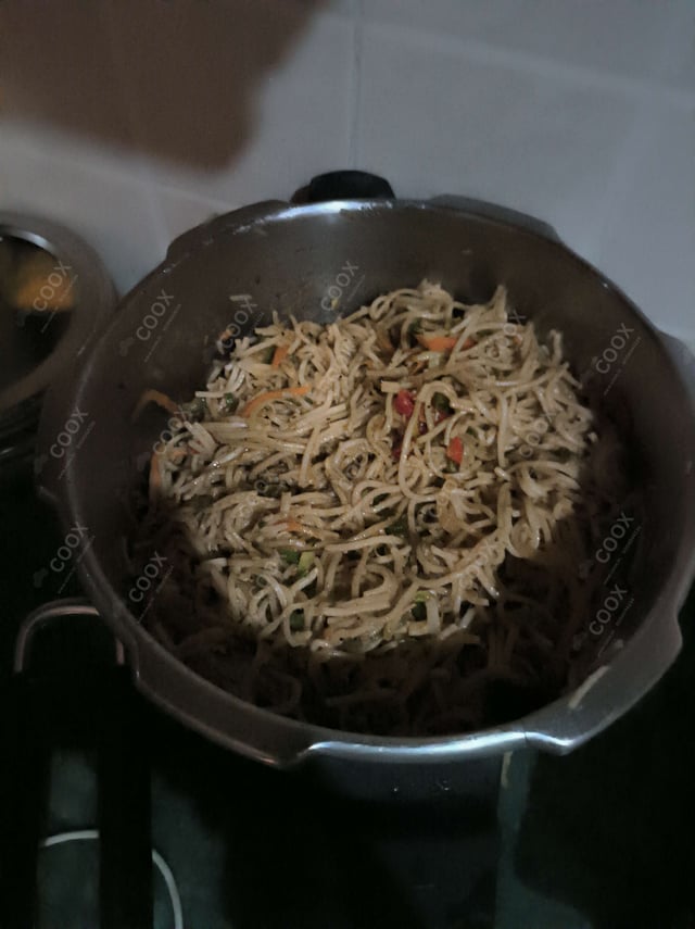Delicious Veg Hakka Noodles prepared by COOX