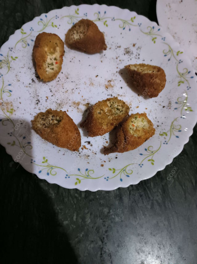 Delicious Dahi ke Sholey prepared by COOX