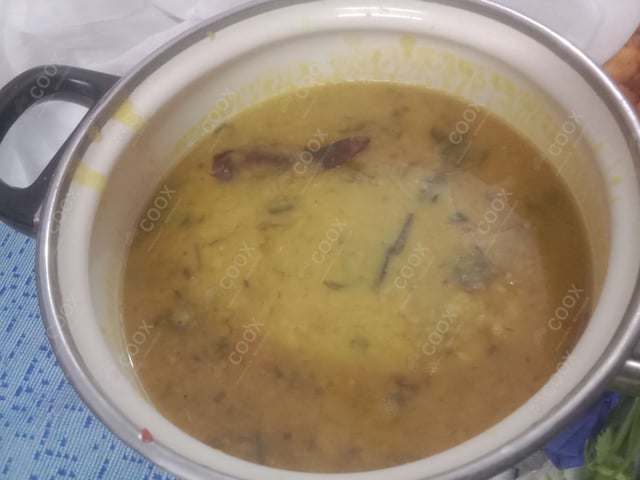 Tasty Palak Dal cooked by COOX chefs cooks during occasions parties events at home