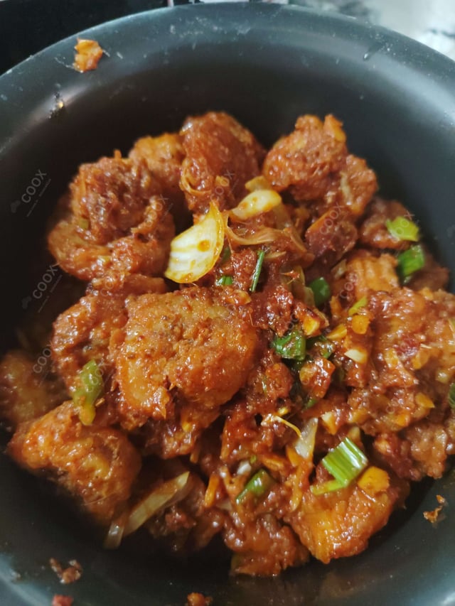 Tasty Red Chilli Prawns cooked by COOX chefs cooks during occasions parties events at home