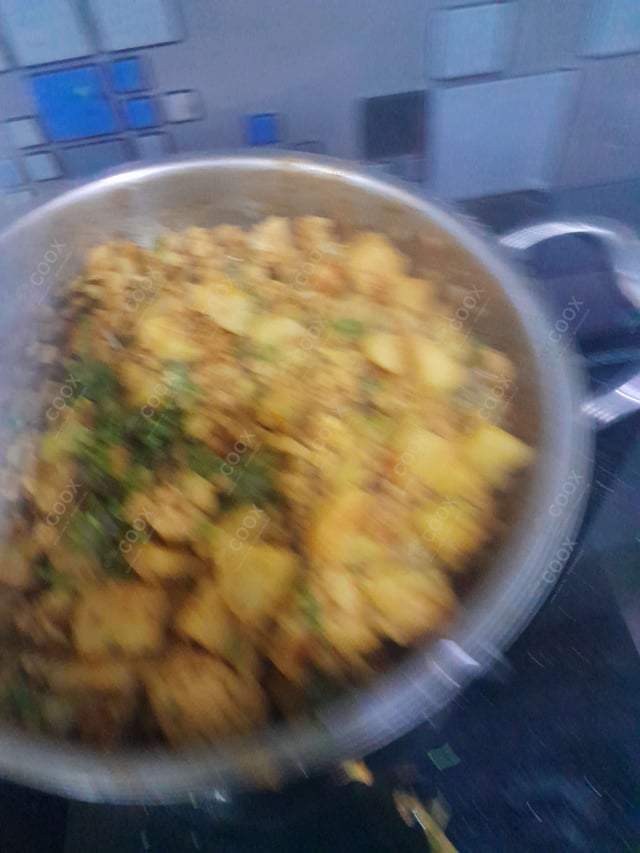 Delicious Pooris & Bedmis prepared by COOX