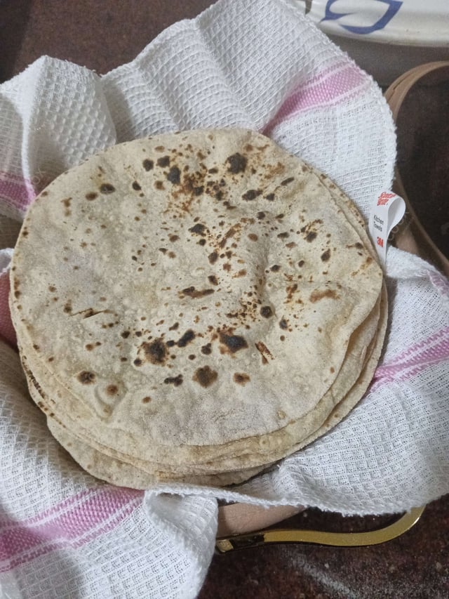 Delicious Tawa Rotis prepared by COOX