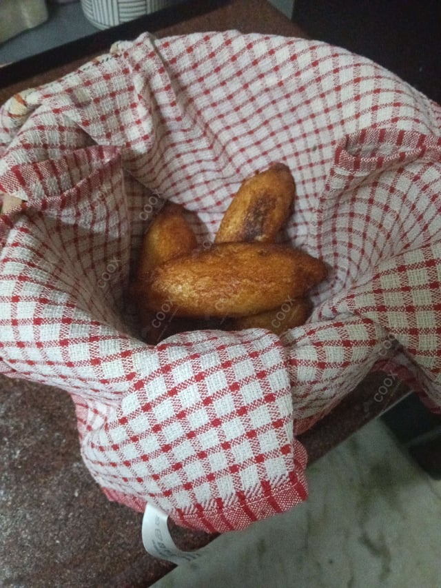 Delicious Dahi ke Sholey prepared by COOX