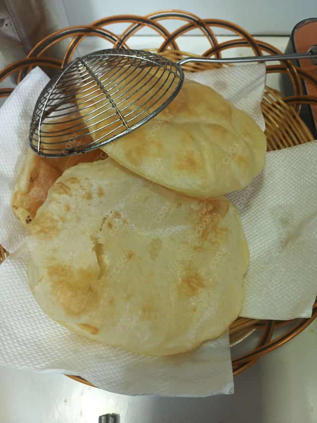 Delicious Bhature prepared by COOX