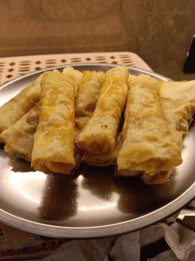 Delicious Veg Spring Rolls prepared by COOX