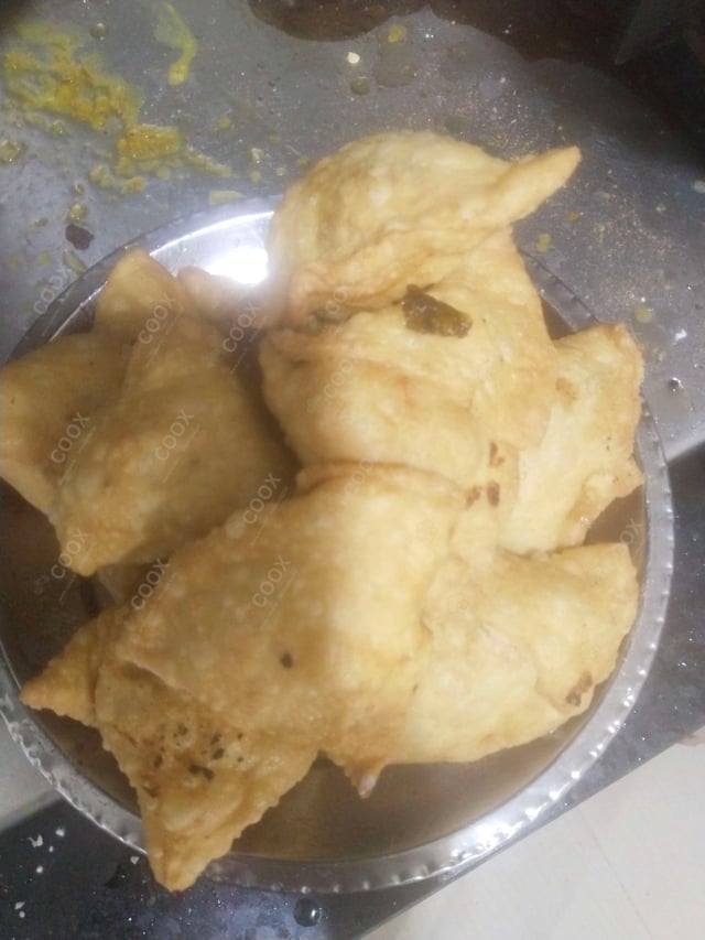 Delicious Mini Samosas prepared by COOX
