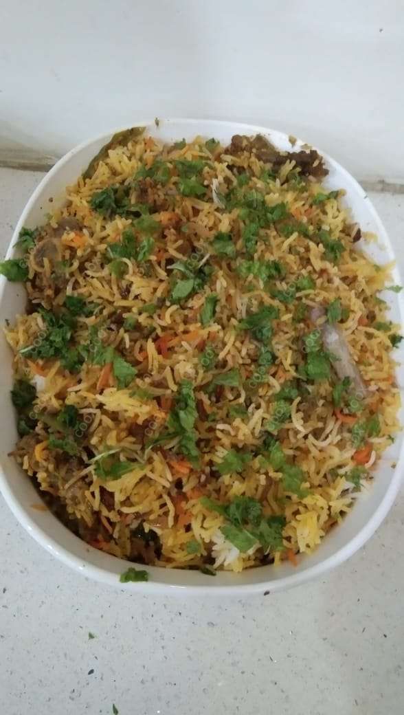 Tasty Mutton Biryani cooked by COOX chefs cooks during occasions parties events at home