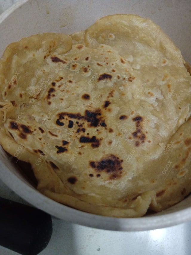 Delicious Lachha Paranthas prepared by COOX