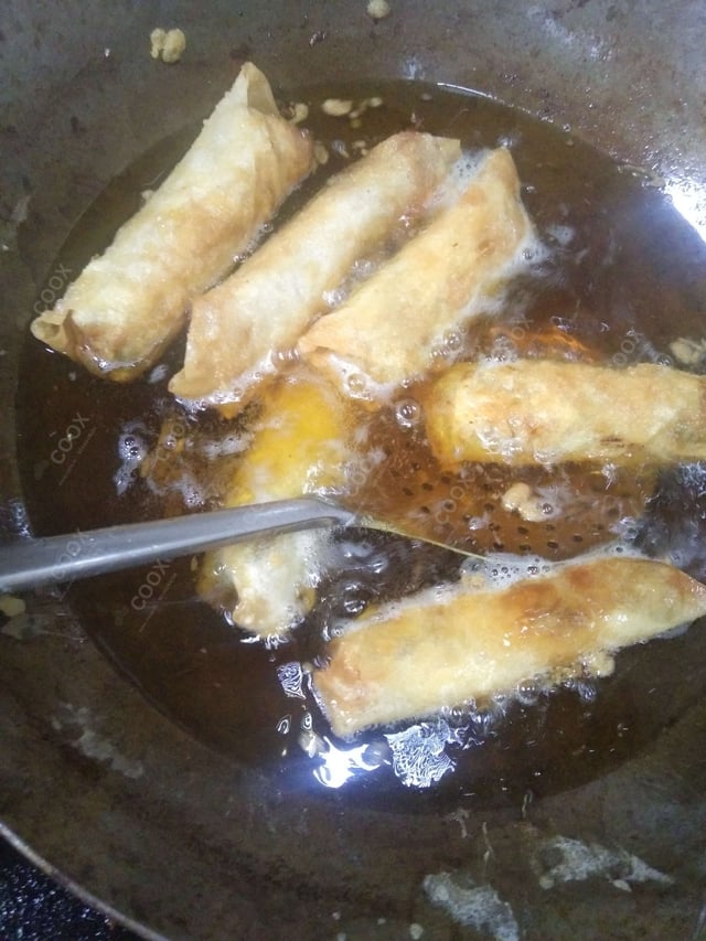 Delicious Veg Spring Rolls prepared by COOX