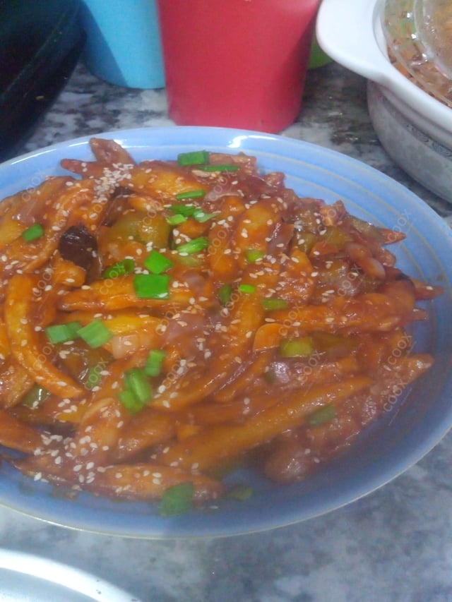 Delicious Honey Chilli Potato prepared by COOX