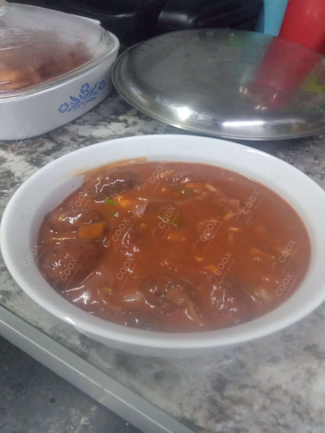 Delicious Veg Manchurian (Gravy) prepared by COOX