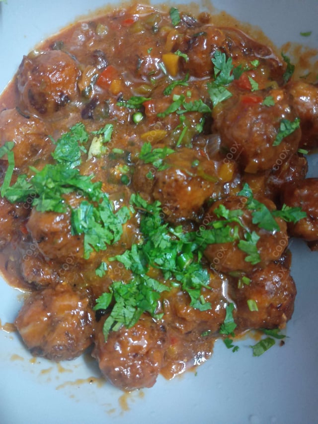 Delicious Veg Manchurian (Dry) prepared by COOX