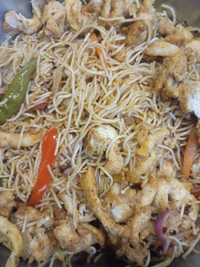 Tasty Chicken Chilli Garlic Noodles cooked by COOX chefs cooks during occasions parties events at home