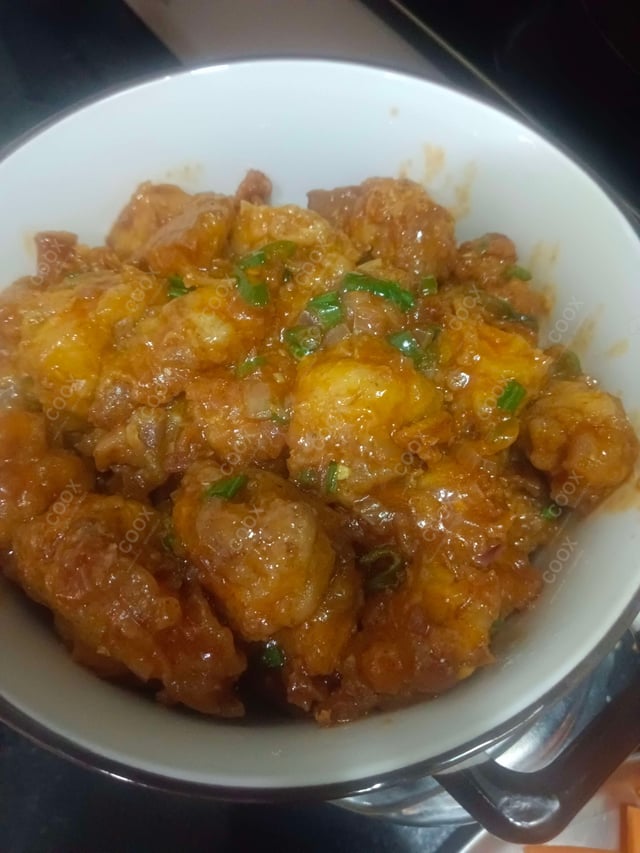 Tasty Chicken Manchurian (Dry) cooked by COOX chefs cooks during occasions parties events at home
