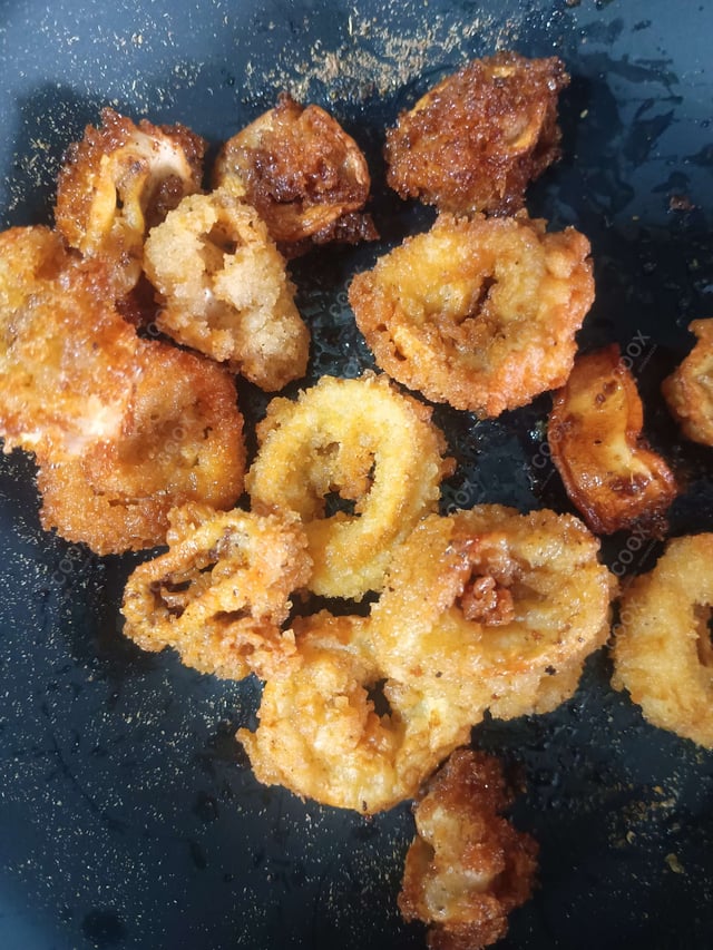Tasty Calamari Rings cooked by COOX chefs cooks during occasions parties events at home