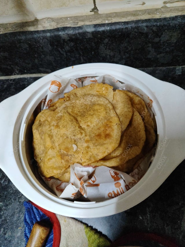 Delicious Bhature prepared by COOX