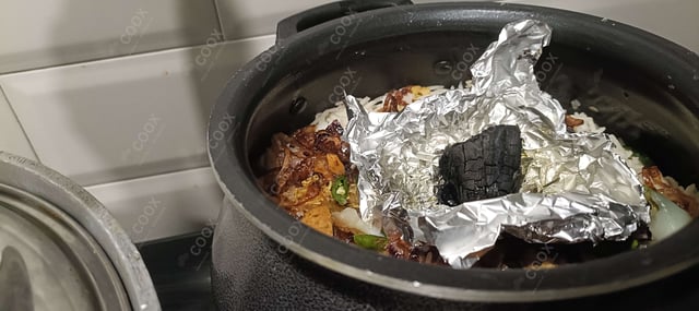 Delicious Chicken Biryani prepared by COOX