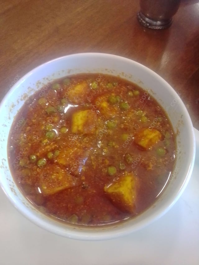 Delicious Matar Paneer prepared by COOX