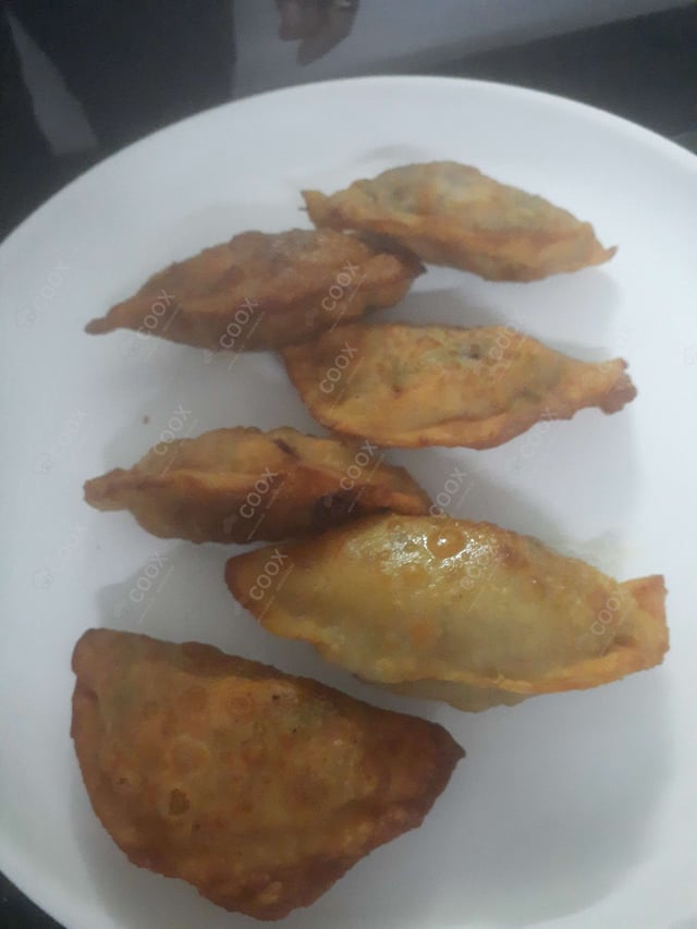 Tasty Veg Empanada cooked by COOX chefs cooks during occasions parties events at home