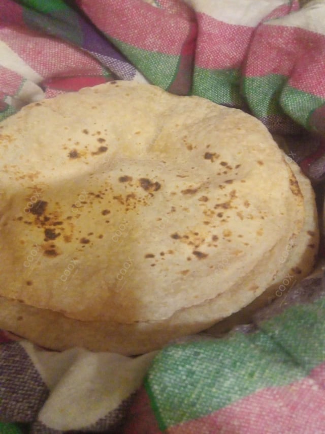 Delicious Naan (Butter / Garlic) prepared by COOX