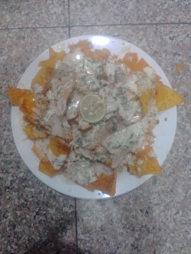 Delicious Cheese Nachos prepared by COOX