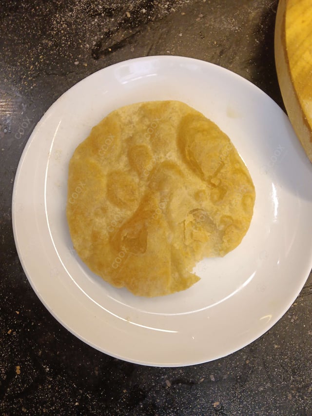 Delicious Pooris & Bedmis prepared by COOX