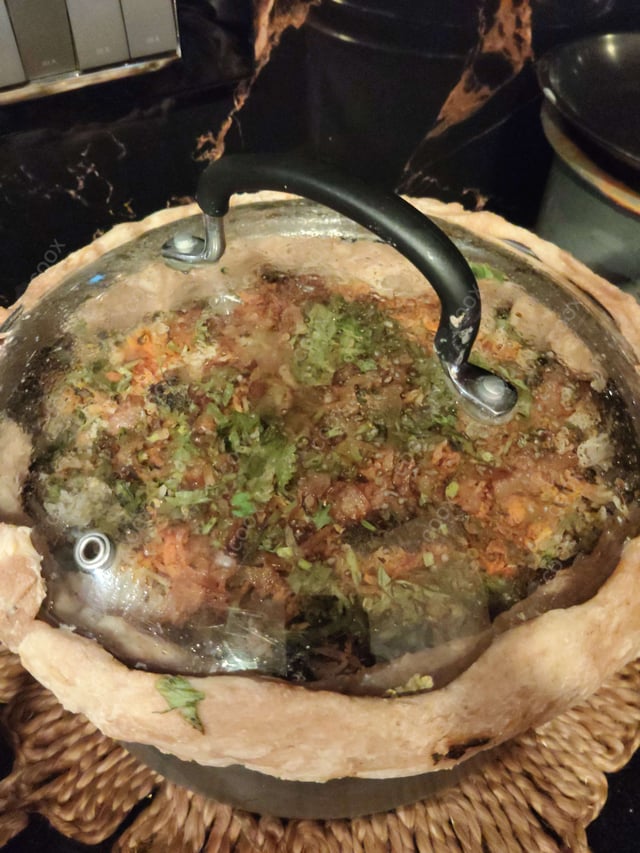 Delicious Veg Biryani prepared by COOX