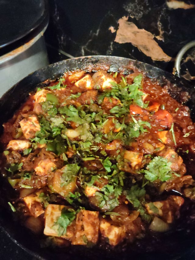 Delicious Kadhai Paneer prepared by COOX