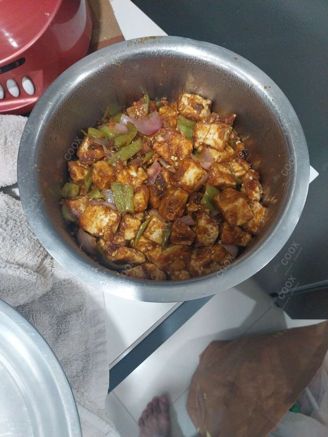 Delicious Chilli Paneer (Dry) prepared by COOX