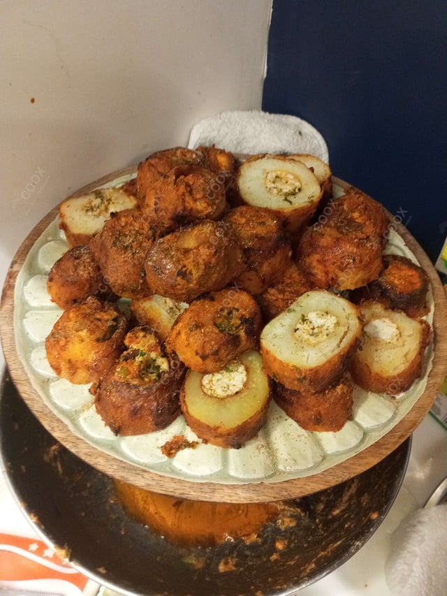 Delicious Tandoori Aloo prepared by COOX