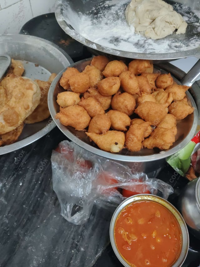 Delicious Chana Bhatura prepared by COOX