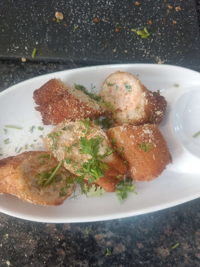 Delicious Dahi ke Sholey prepared by COOX