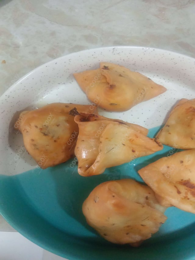 Delicious Mini Samosas prepared by COOX