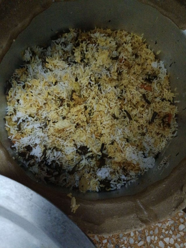 Delicious Veg Biryani prepared by COOX