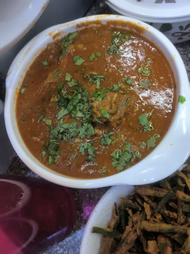 Delicious Mutton Rogan Josh prepared by COOX